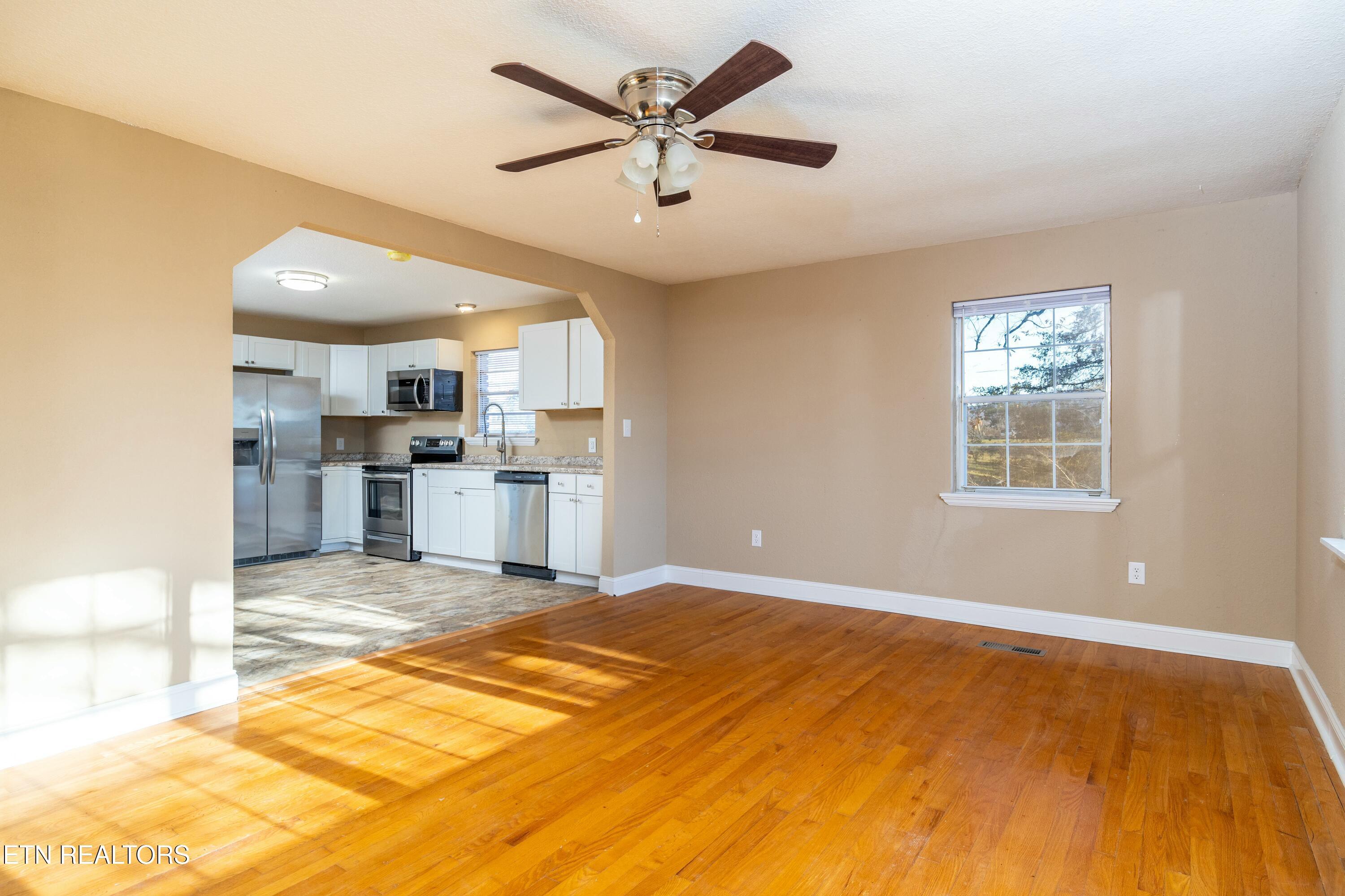 Image 3: Family Room Toward the Kitchen
