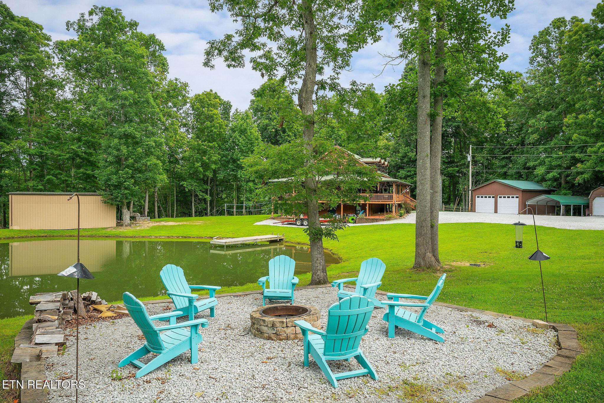 Image 1: POND WITH FIRE PIT