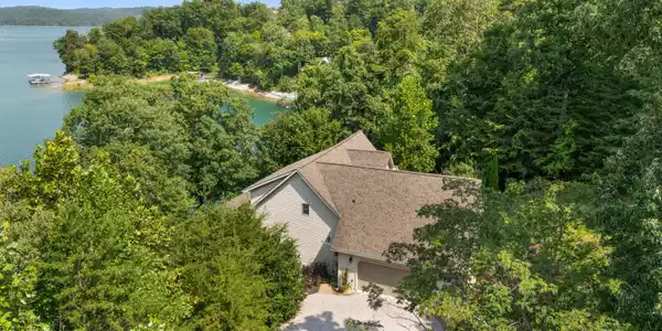 Image 2: Aeril view of front of house