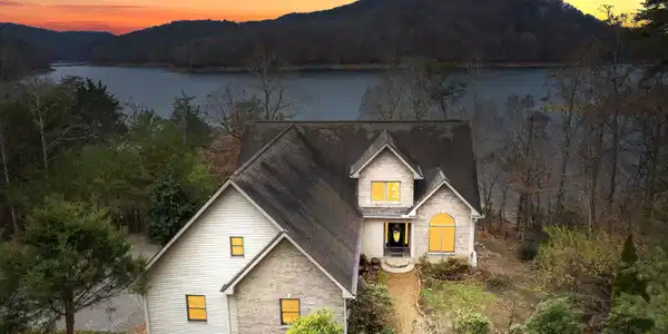Image 3: View of home from the street evening