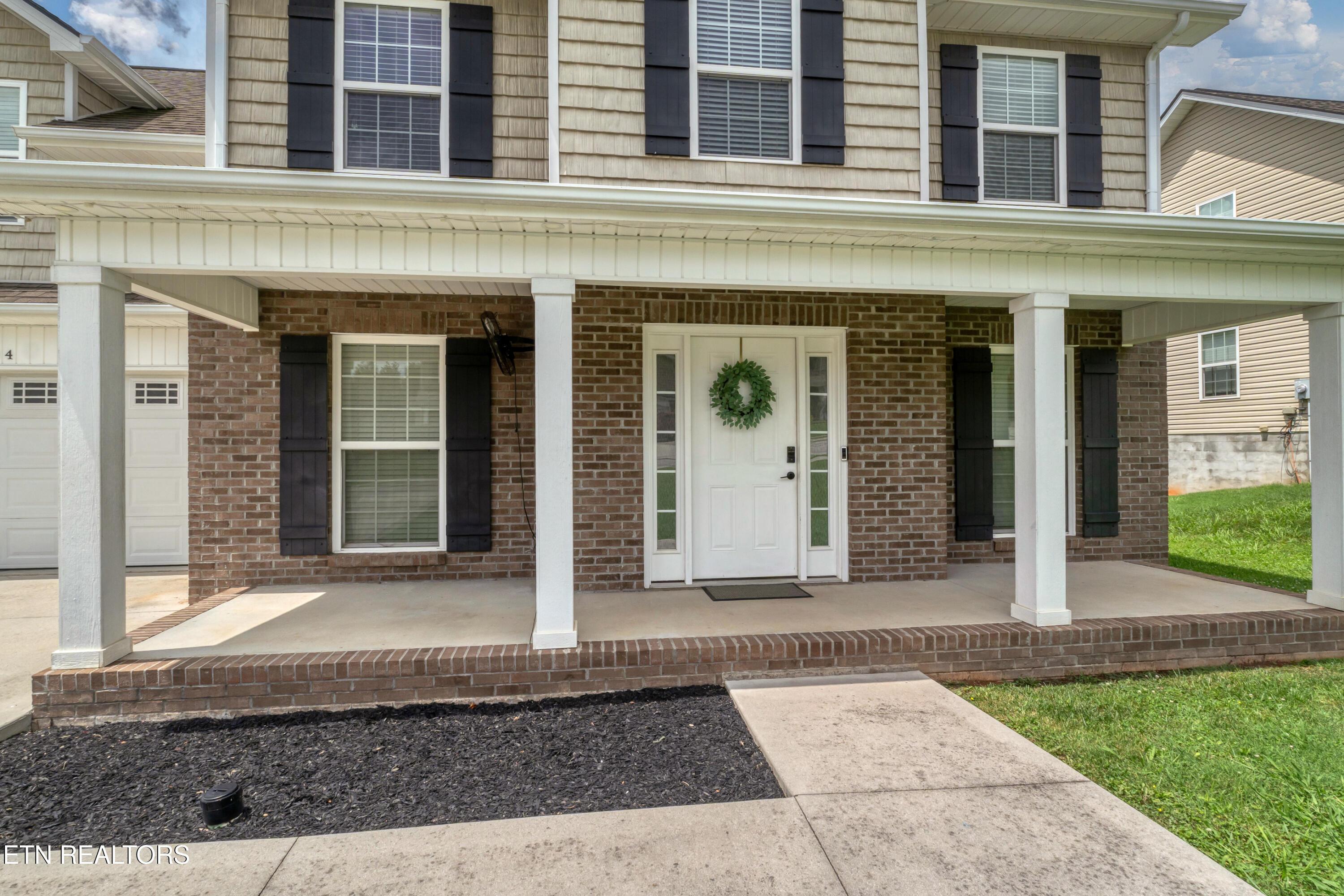 Image 4: Covered front porch!