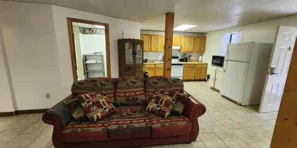 Image 2: Suite A -- Basement Living Room A
