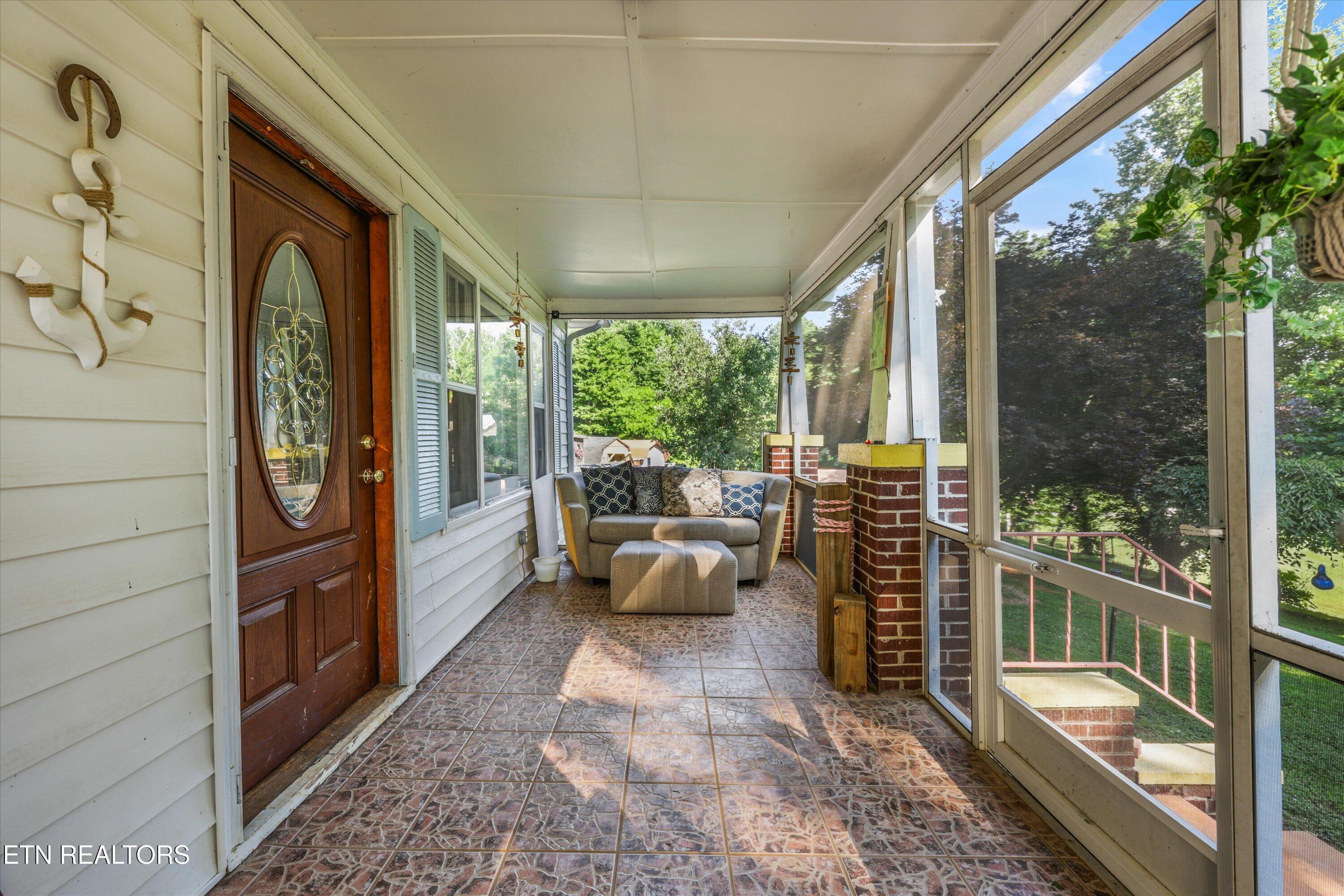 Image 3: Expansive Covered Front Porch