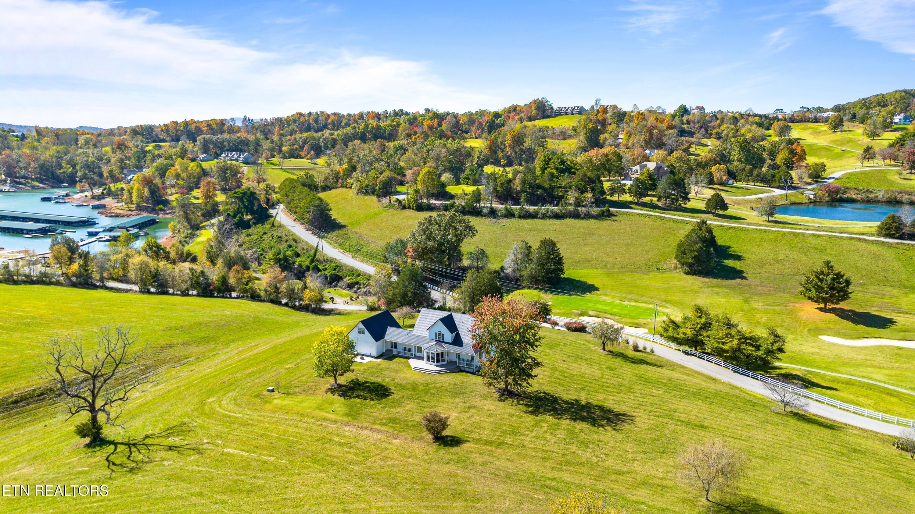 Image 3: View of lake and golf course