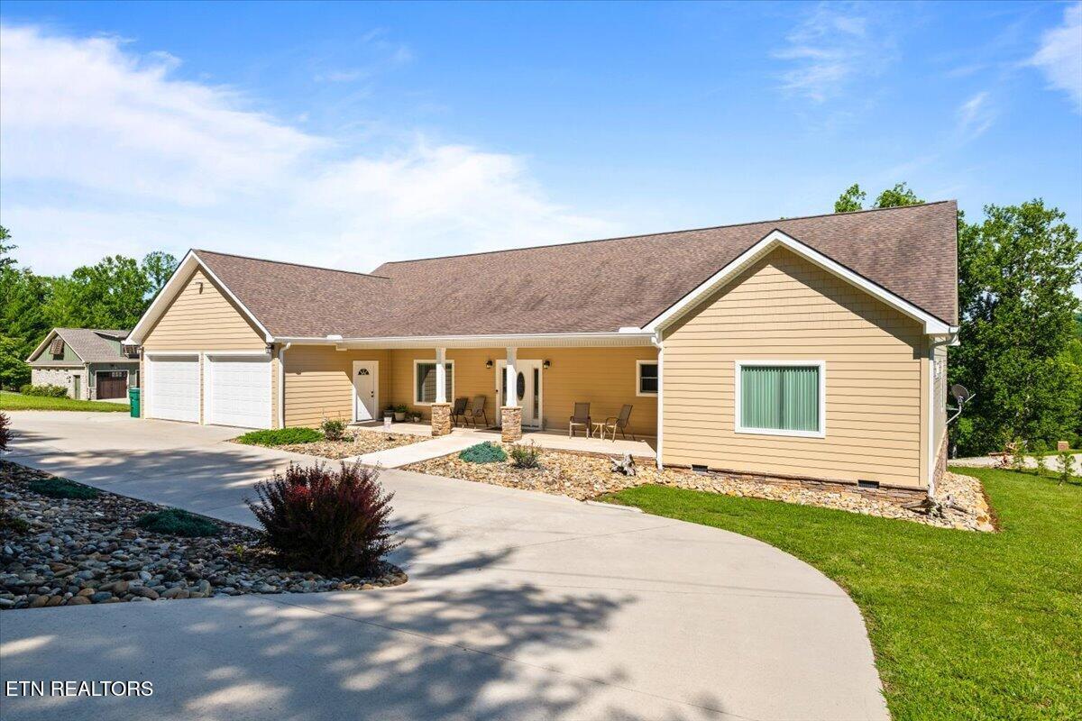 Image 2: Front of House From Front Right