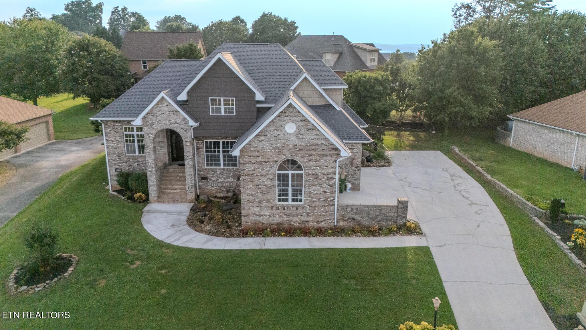 Image 2: Drone front (sidewalk, drive and garage
