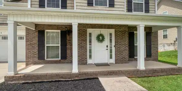 Image 4: Covered front porch!