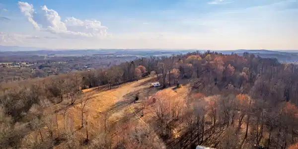 Image 3: Drone of barn and cabin