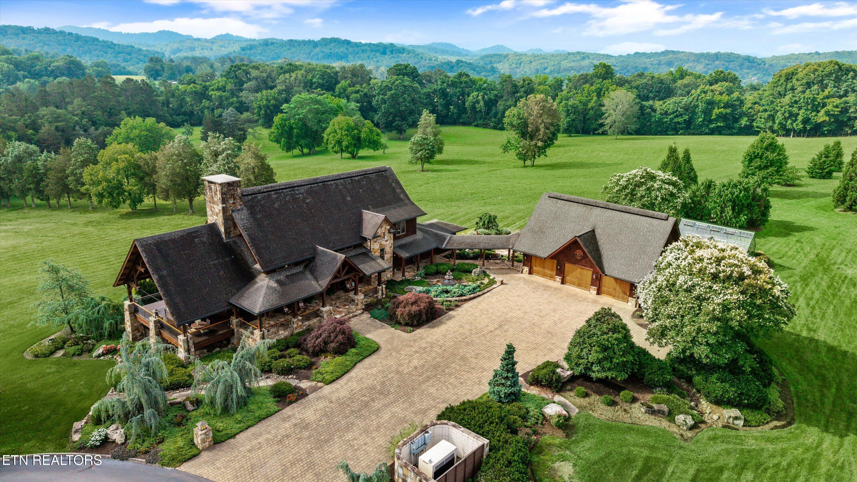 Image 2: House & Carriage House with Mountains