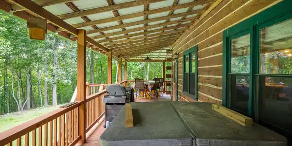 Image 2: BACK DECK OF LOG HOME