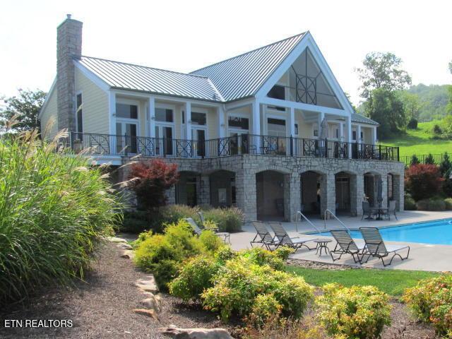 Image 4: Community clubhouse and pool