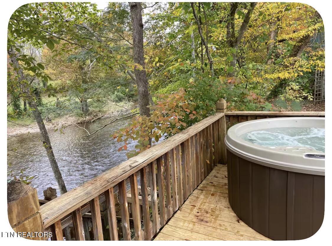 Image 2: Hot Tub Overlooking River