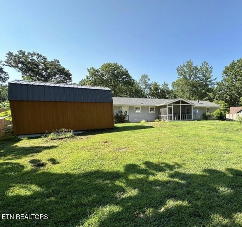 Image 2: Backyard with shed