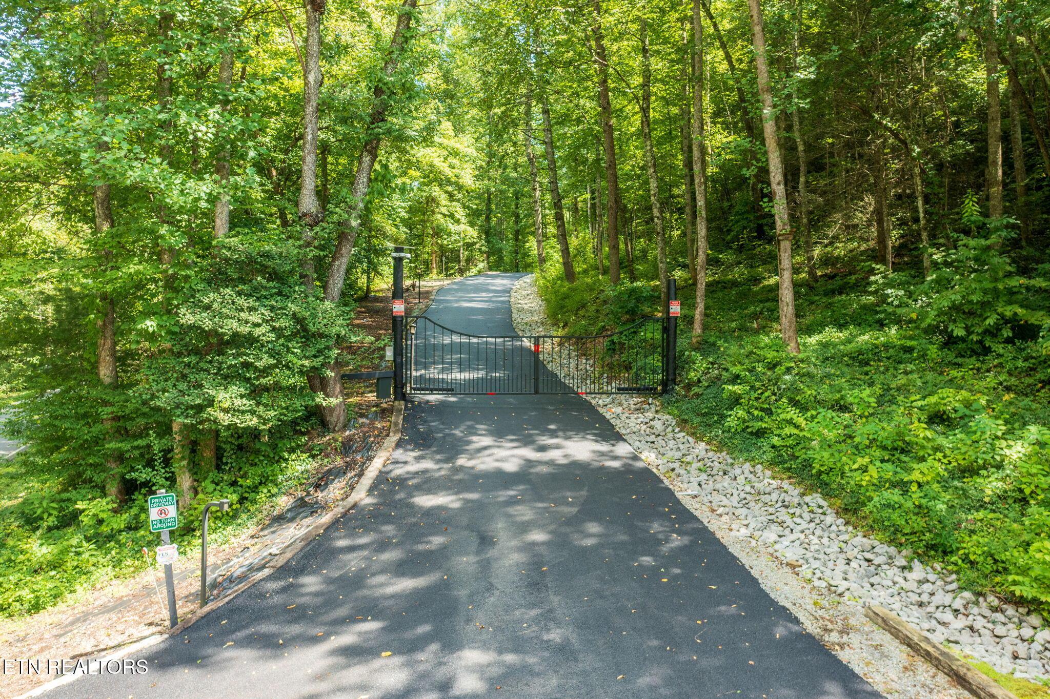 Image 4: Gated entrance at 2050 EMC Rd