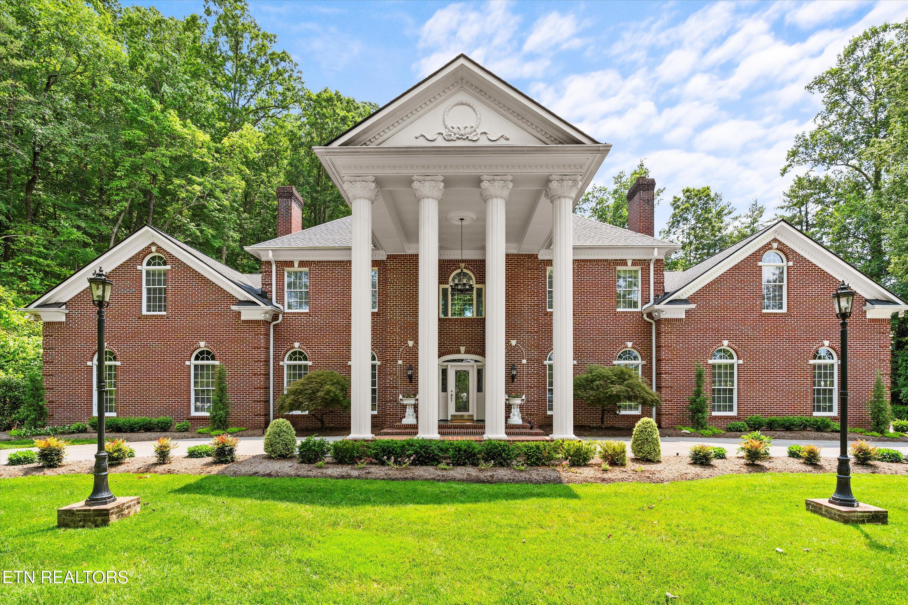 Image 1: Stately all brick executive home