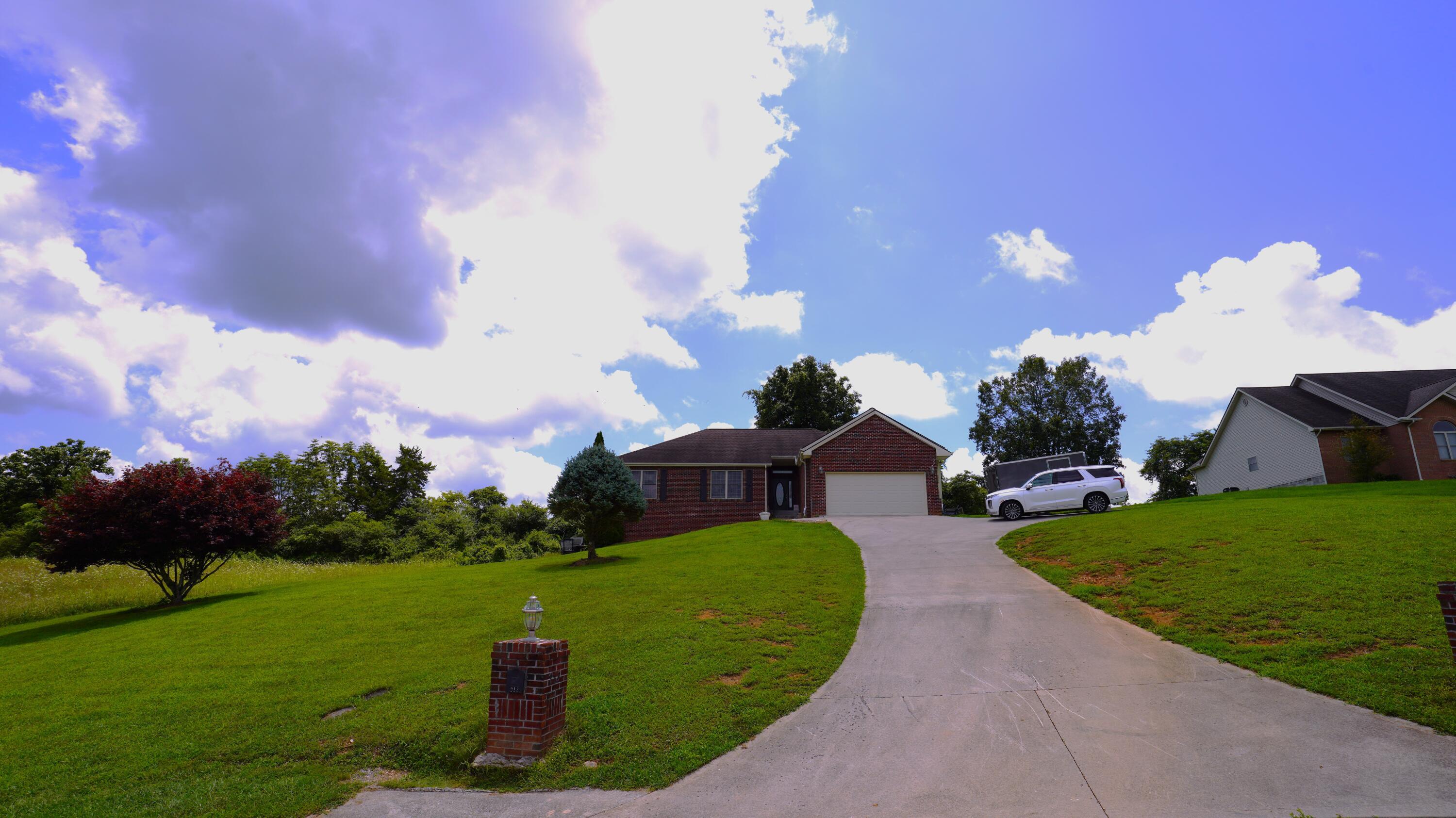 Image 3: Front of 213 Melissa Ln