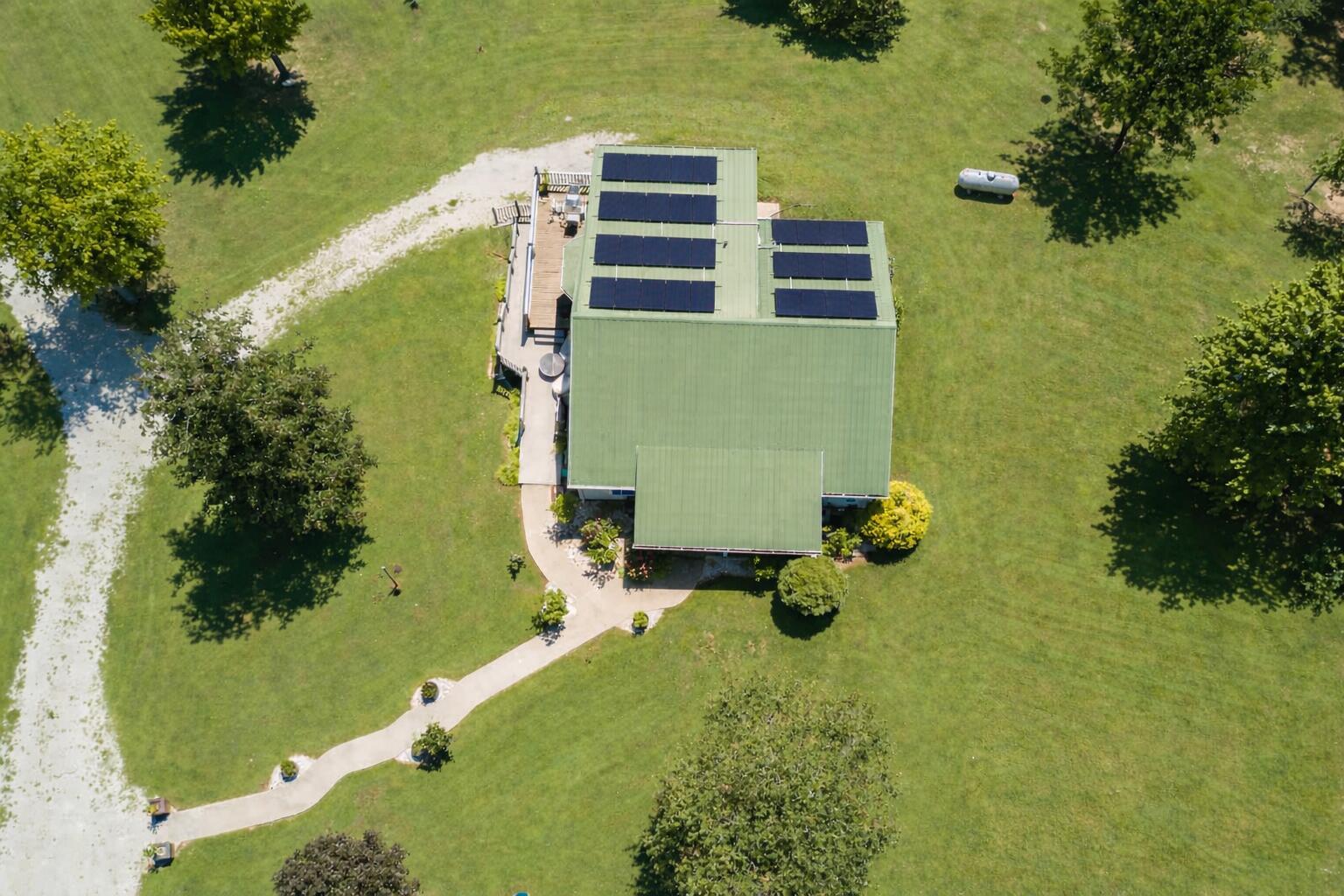 Image 2: Green-roofed house with solar panels (1)