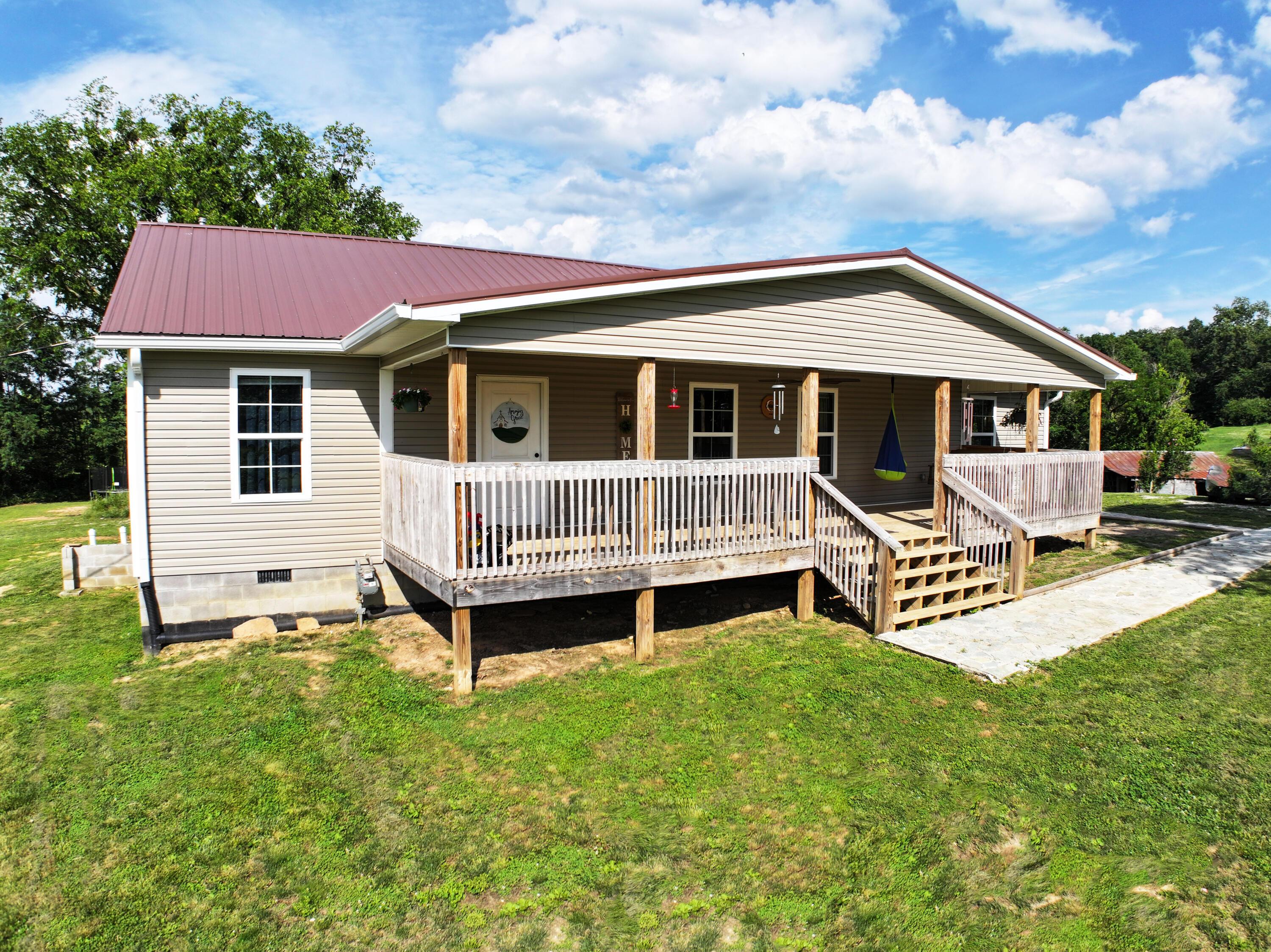 Image 3: Large covered front porch!