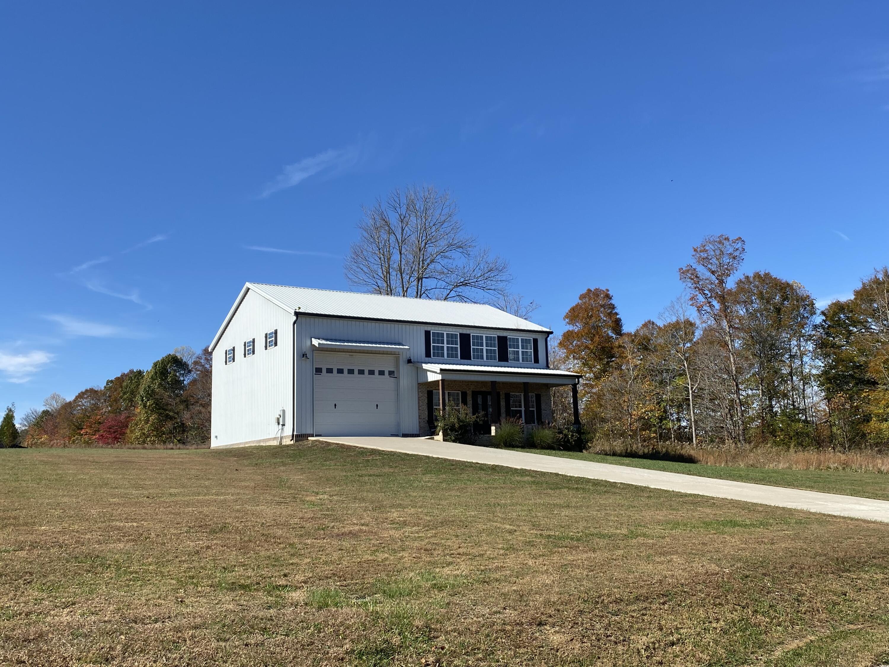 Image 4: White barndominium 2