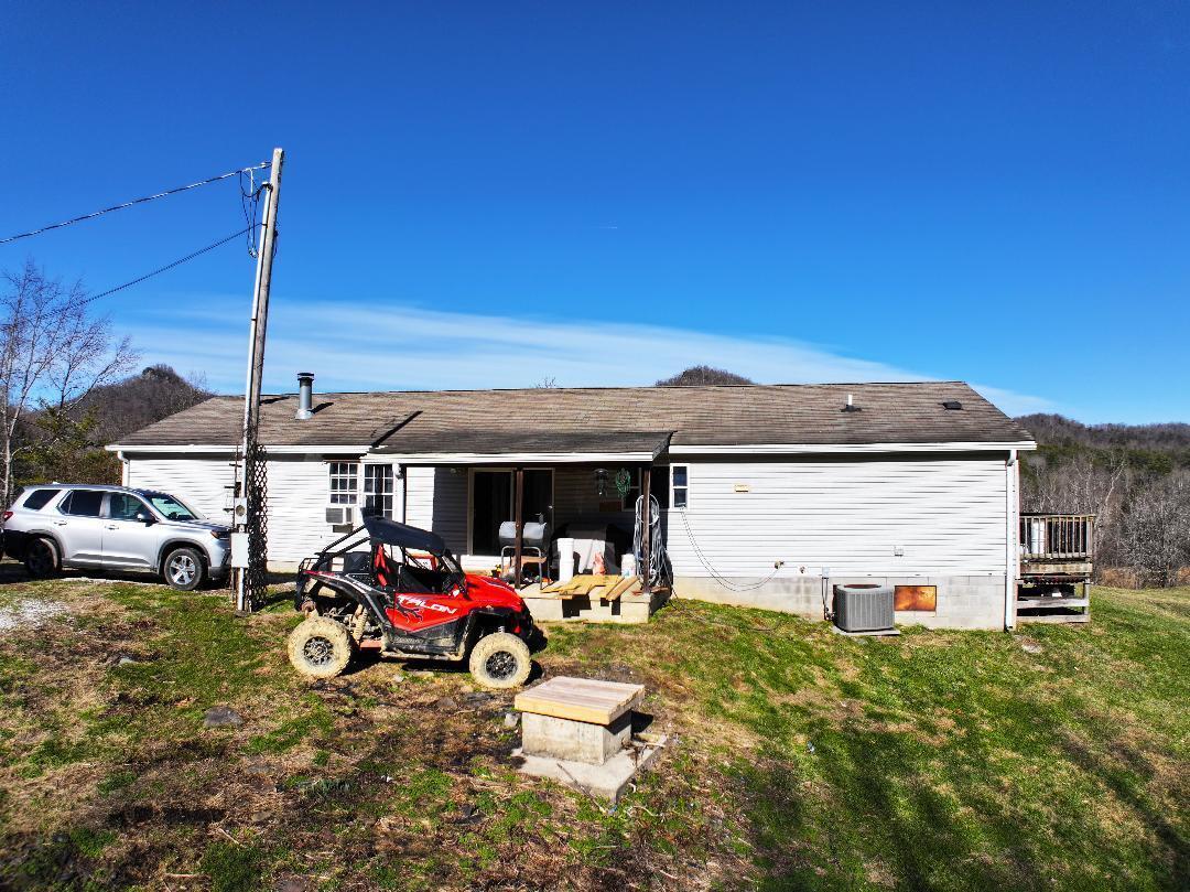 Image 3: Back of home!