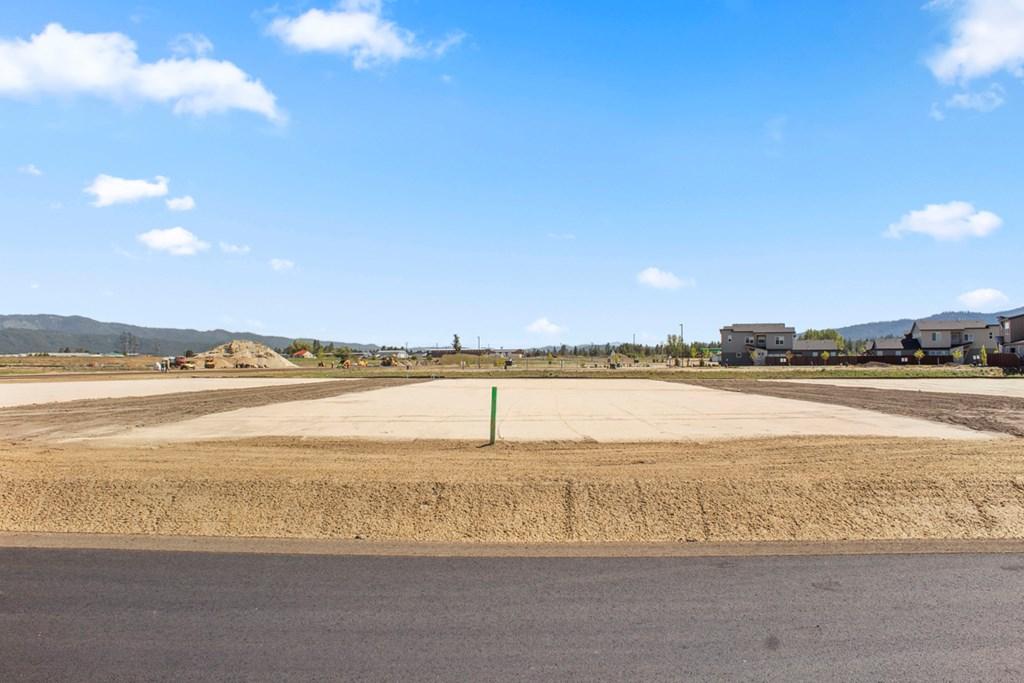 Image 4: Large Level Lot With City Services
