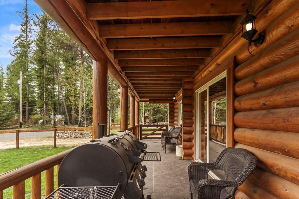 Image 4: Deck Spans Front of Home