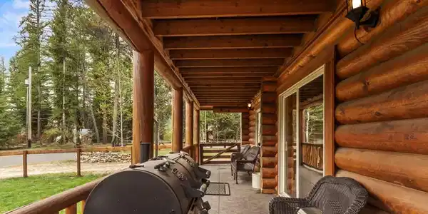 Image 4: Deck Spans Front of Home
