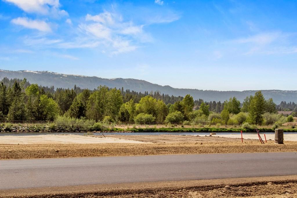 Image 2: Peek-a-Boo View of Payette River & Mountains