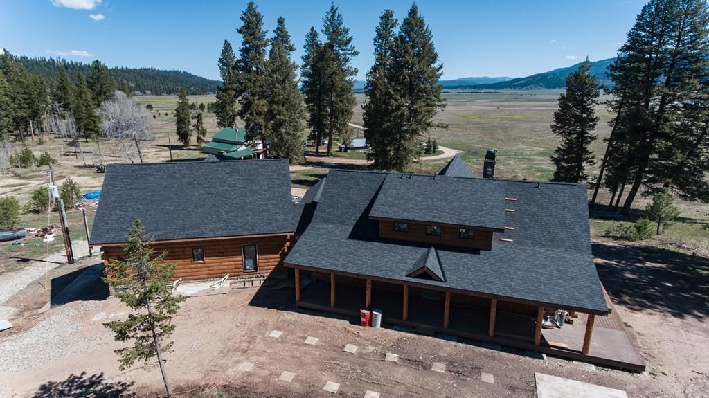 Image 2: Unfinished log cabin (7171 SF)