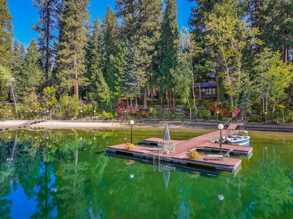 Image 4: Dock and beach area, Imagine spending your summers in this magnificent spot.