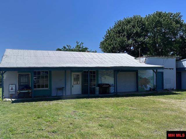 Image 2: 28x60 shop w/ overhead door