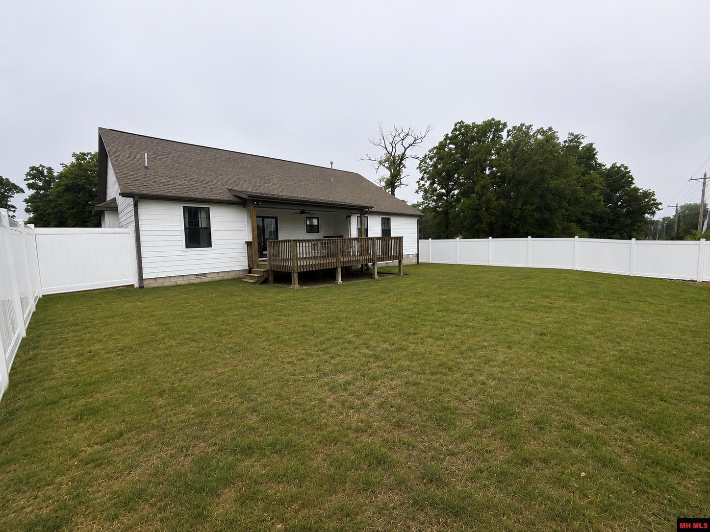 Image 3: Back yard and back of house, Back