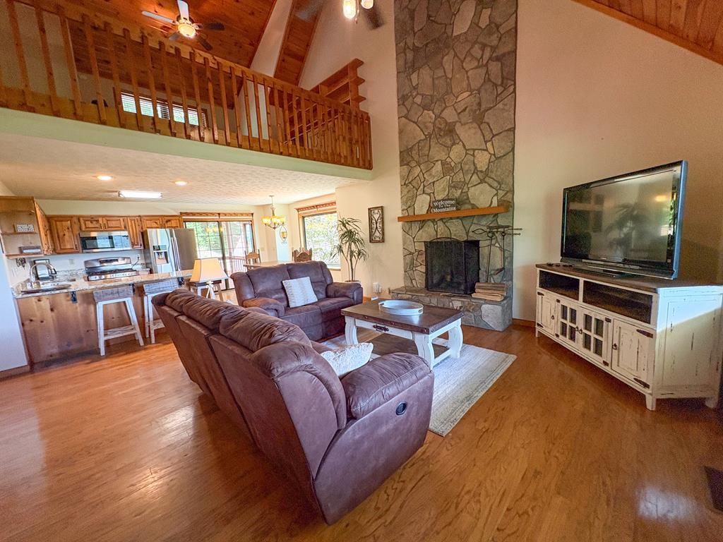 Image 2: Great Room, Spacious great room with wood burning fireplace.