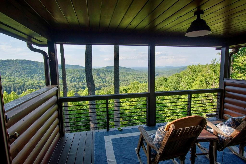 Image 3: Third floor sky deck, Enjoy your coffee or a cocktail over looking the Georgia, North Carolina and Tennessee long range mountain views.