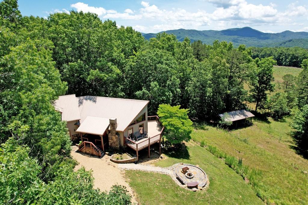 Image 2: Aerial - house and mountains