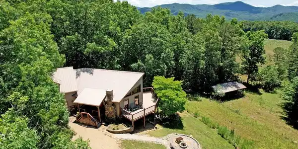 Image 2: Aerial - house and mountains