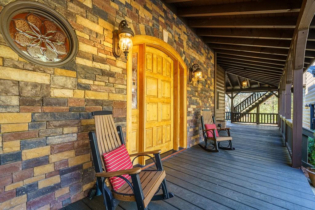 Image 4: Wrap around porch to back of home