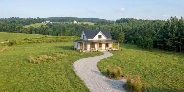 Image 2: Build your dream home!, This is what your new home could look like! There is no home on the land but the possibilities are endless with this acreage for your new home.
