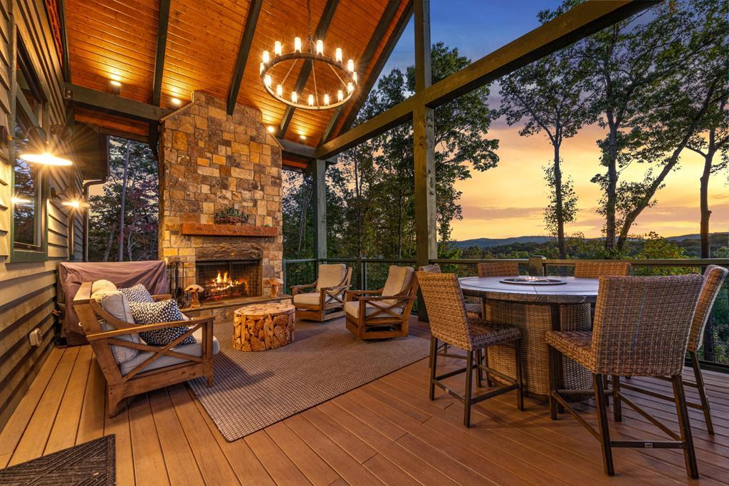 Image 3: Wow covered porch with fireplace