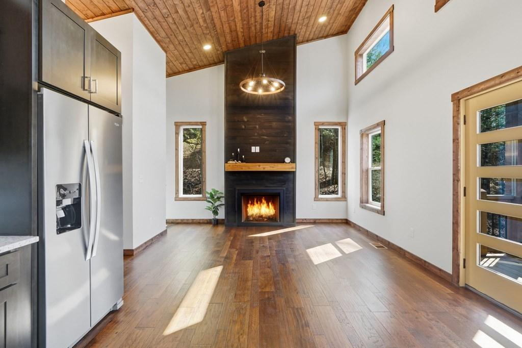 Image 3: Fireplace virtually staged with fire