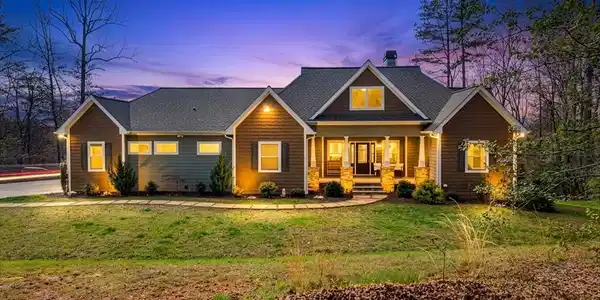 Image 2: Front View, Front Porch opens to Entryway