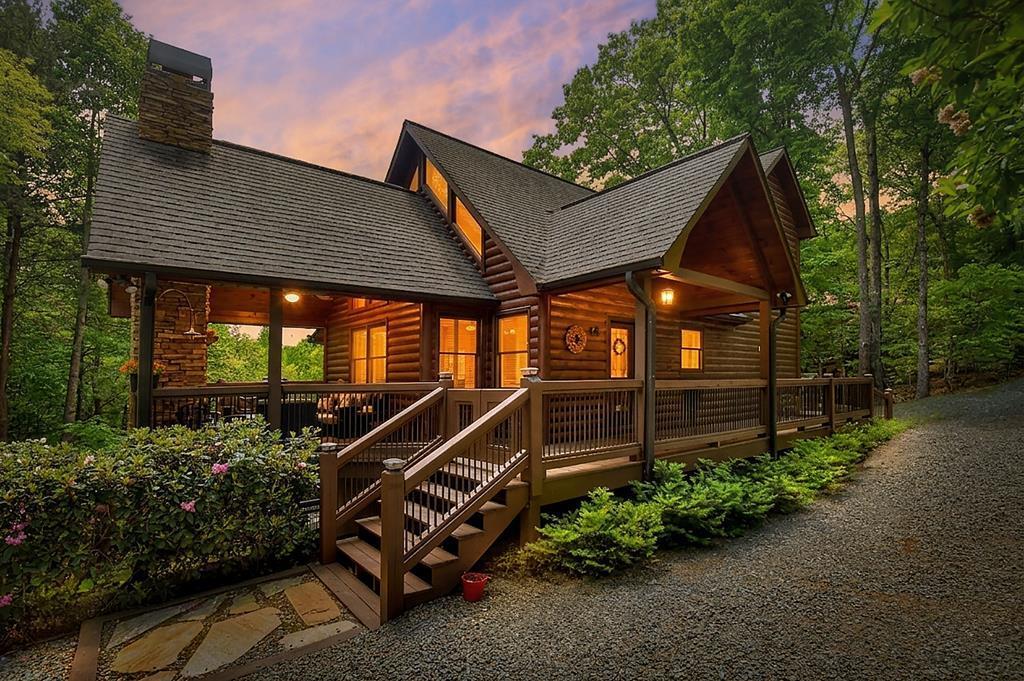 Image 2: Back of the home facing the seasonal views with pr, Spacious back yard space