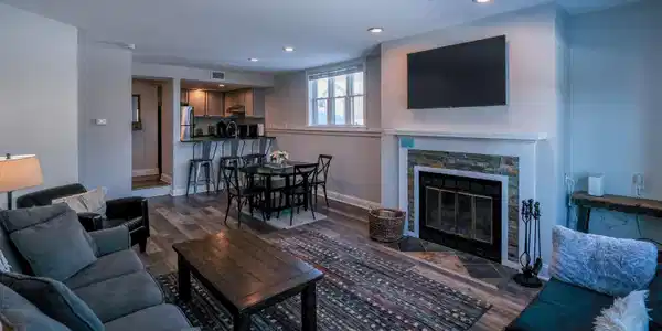 Image 3: Living room with wood burning fireplace