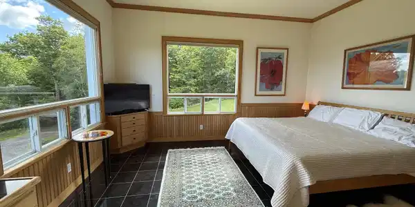 Image 4: PRIMARY BEDROOM ON MAIN FLOOR