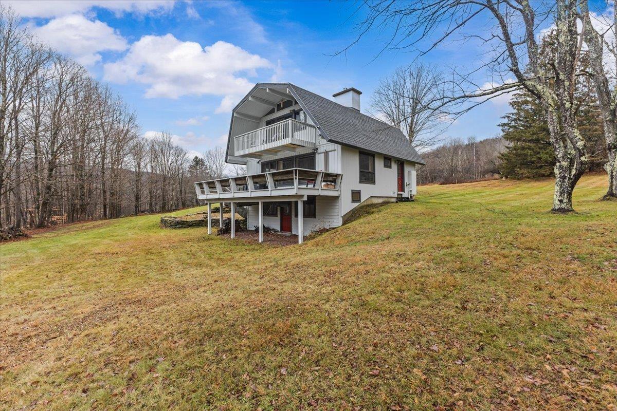 Image 4: Rear view of home from right side