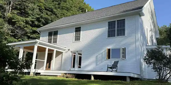 Image 3: COVERED PORCH AREA LOOKING OVER MEADOW