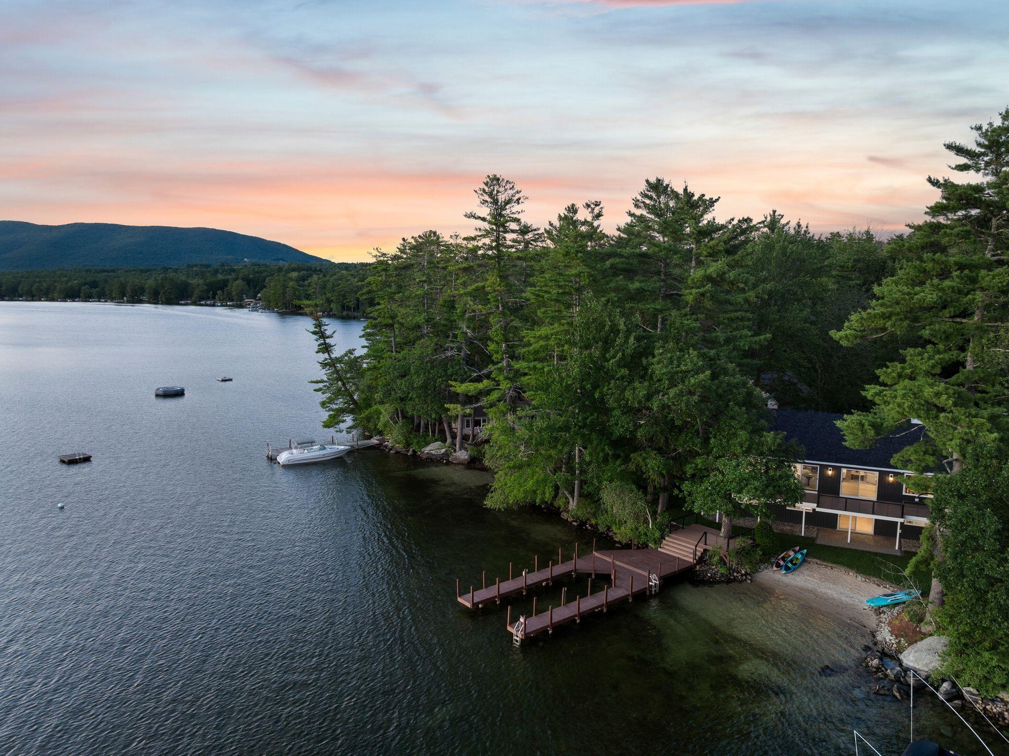 Image 3: Enjoy Moultonborough&rsquo;s low taxes while being just minutes from the charm of Center Harbor&rsquo;s downtown &mdash; with shopping, dining, groceries, and ice cream all within easy reach