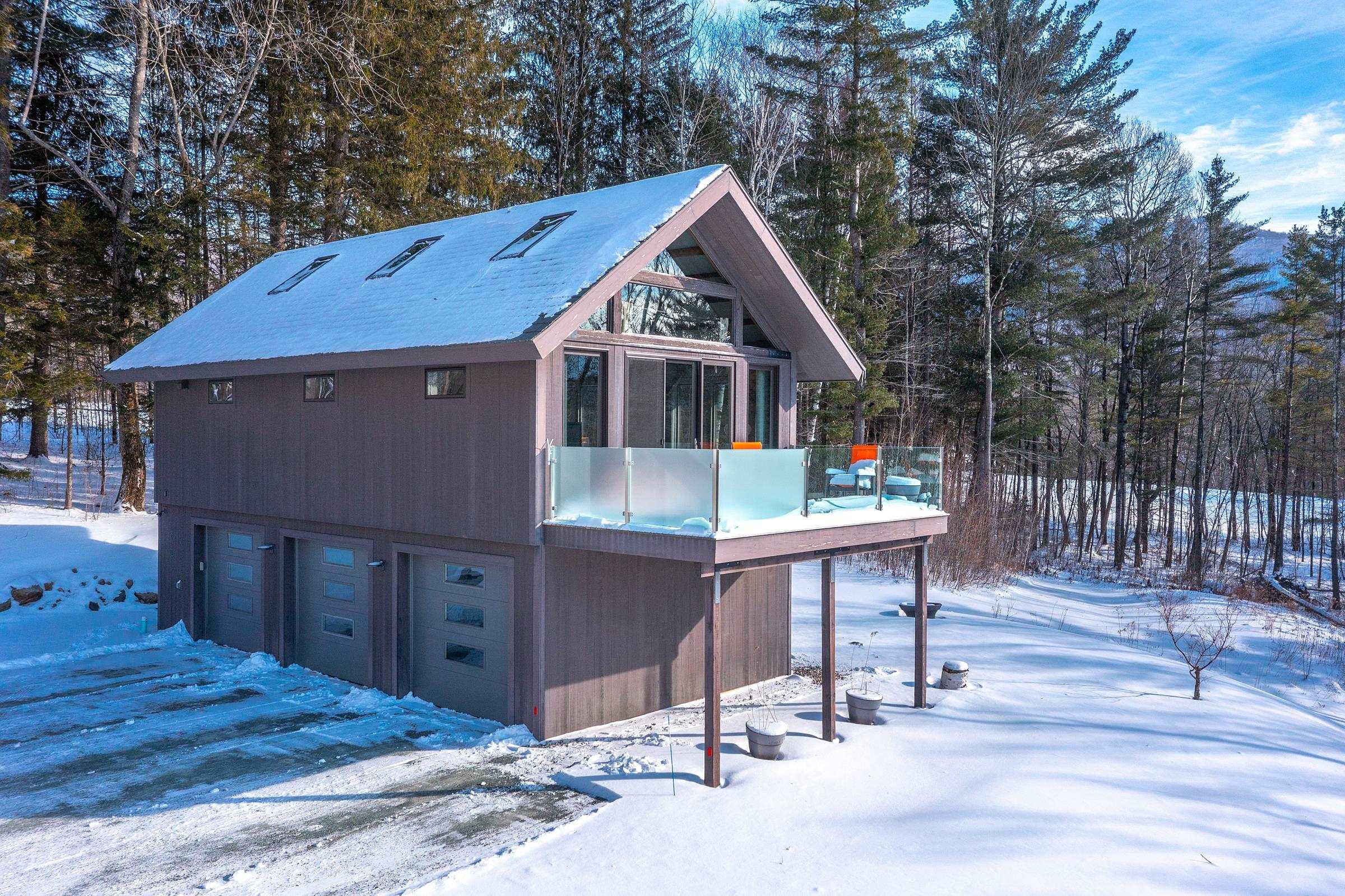 Image 4: Detached 3 car garage with apt above