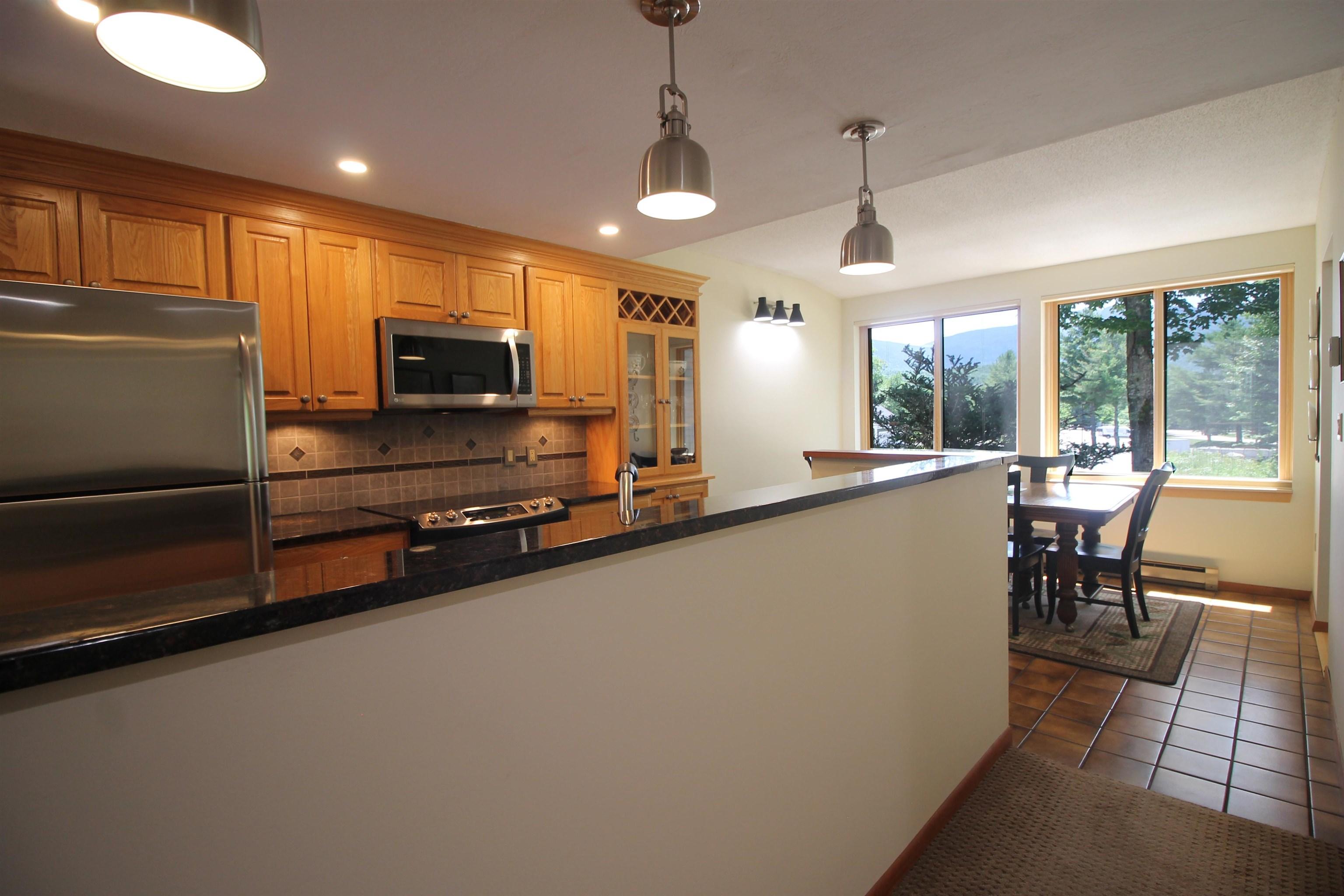 Image 4: Galley style kitchen attached to the dining area Image 4: Galley style kitchen attached to the dining area