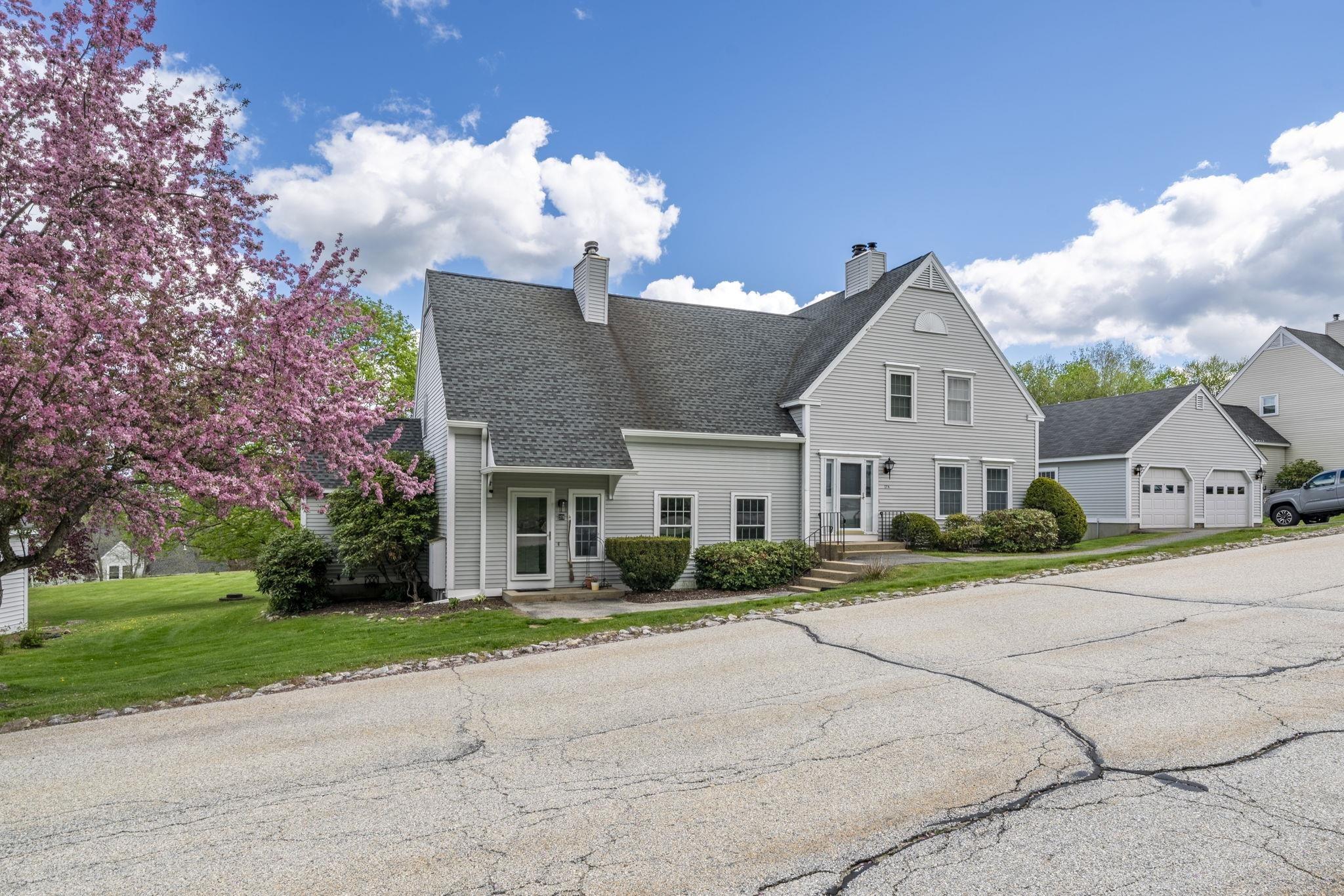 Image 4: Front View with Detached Garage Image 4: Front View with Detached Garage